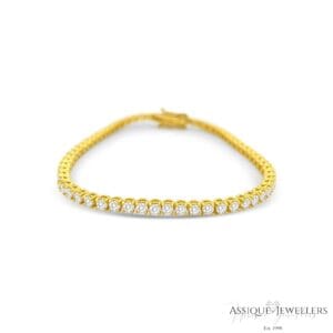 Yellow gold round cut tennis bracelet