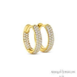 Yellow gold diamond huggie earrings