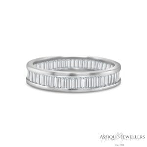 White gold baguette cut half eternity band