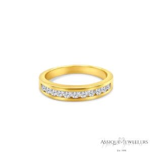 Yellow gold channel set diamond wedding band